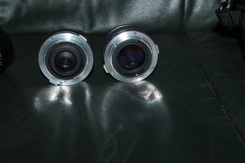 Olympus OM 1 Film Camera with three lenses