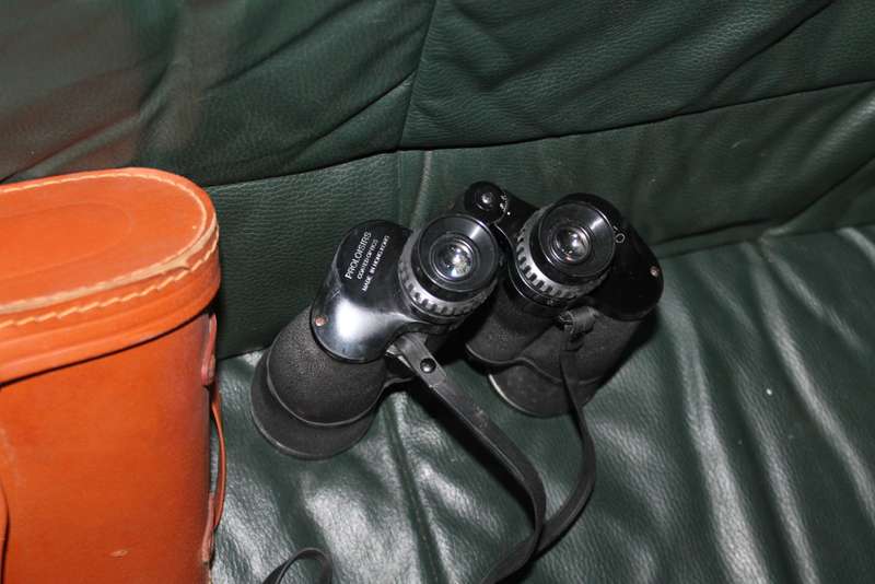 Binoculars in hard leather Case
