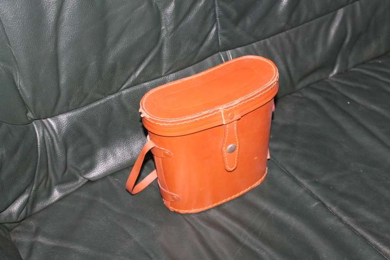 Binoculars in hard leather Case