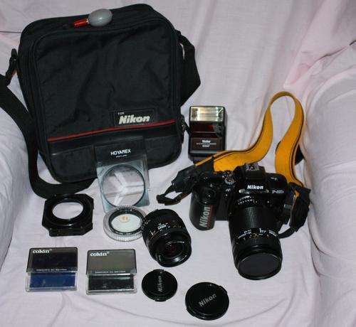 Nikon F 401X with 2 Nikon lenses and extra's