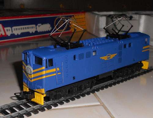 Loco E444, as new except for a spring missing on each pantograph. Single springs do the job though. Decals and  body in perfect condition.
