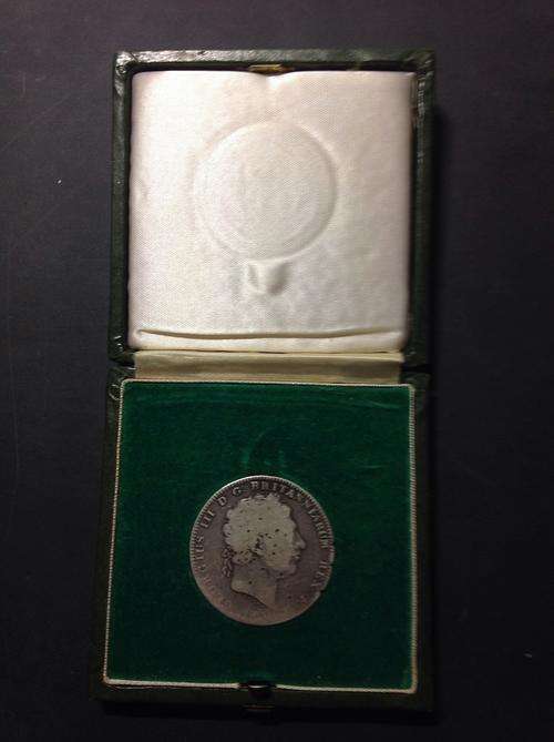 1820 BRITISH SILVER CROWN. WORTH $80 IN WORSE CONDITION. WITH A COIN BOX