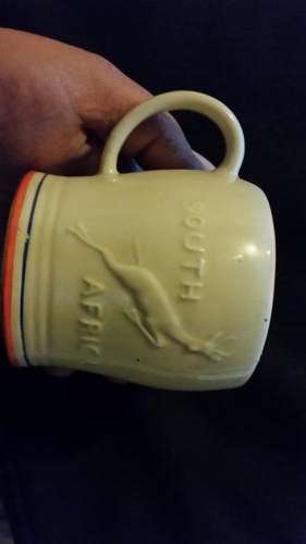EXTREMELY RARE 1947 ROYAL VISIT MUG WITH SPRINGBOK EMBLEM BY CROWN DEVON ENGLAND