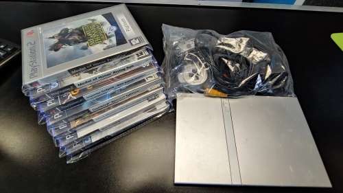 PS2 Silver Console Complete with 7 games