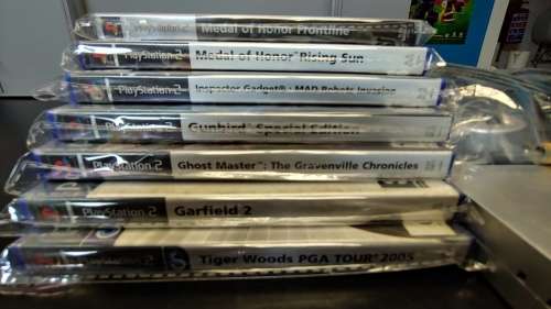 PS2 Silver Console Complete with 7 games