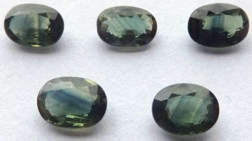 NATURAL GREEN SAPPHIRES - 5 PIECE LOT - 6x4mm OVALS