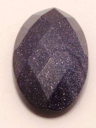 BLUE SANDSTONE FACETED CABOCHON - 15.75ct