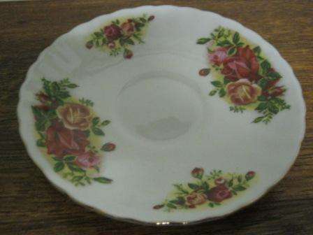 SAUCER WITH  ROSE DESIGN ~~ HAVE A LOOK!!!!