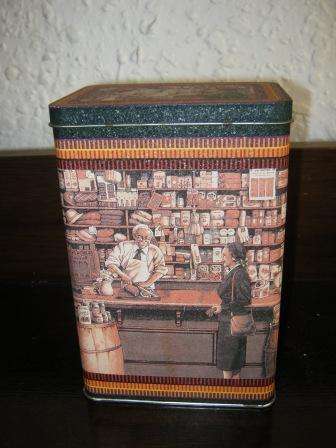 TIN DEPICTING OLD SHOP TO ADD TO YOUR COLLECTION~ IN GOOD CONDITION~HAVE A LOOK!!!