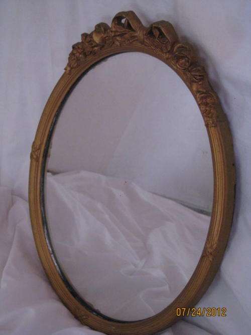 OVAL MIRRIOR 34CM HIGH 26CM LENGTH