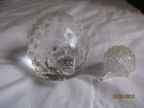 TWO HEDGEHOGS . LARGE APPROX 7CM HIGH AND SMALL APPROX 2.5CM HIGH