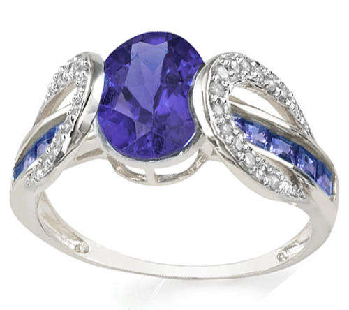 EXCELLENT WELL MADE 3.05CT TANZANITE AND DIAMOND RING IN SOLID 14KT WHITE GOLD