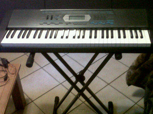 Casio Electronic Keyboard CTK 2100 includes metal stand