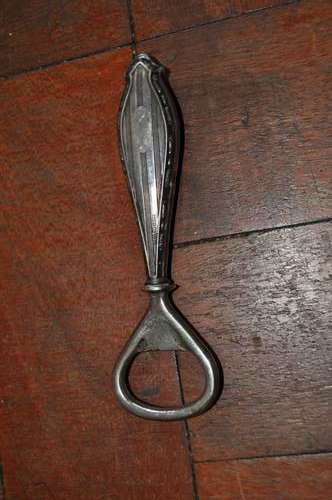 BOTTLE OPENER WITH STERLING SILVER HALLMARKED HANDLE