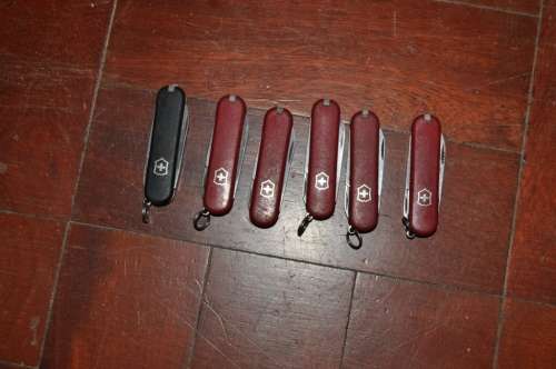 COLLECTION OF SIX ORIGINAL VICTORINOX SWISS ARMY KNIVES