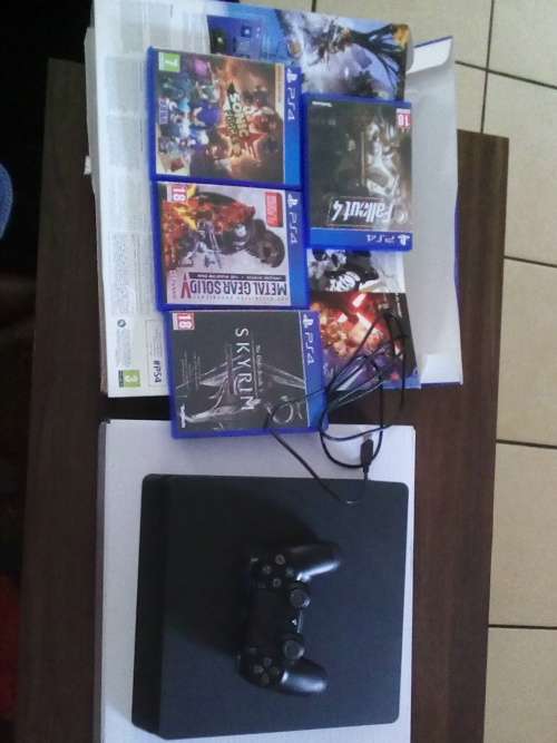 Slim Sony PS4 console with controller & 4 games - 500 gig
