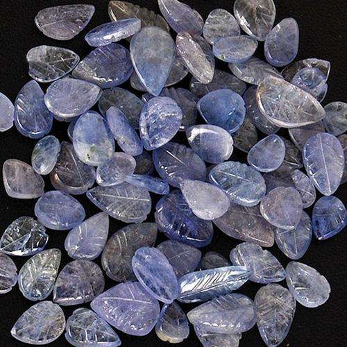 110 CTS/75 PIECES UNTREATED NATURAL TANZANITE HAND CARVED LEAFS