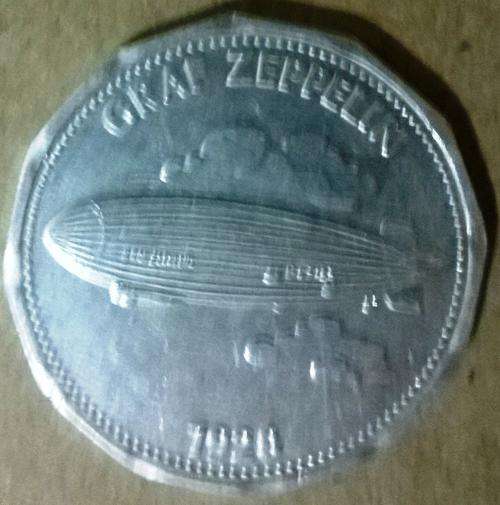 Man in flight 1928  Graf Zeppelin Shell token
