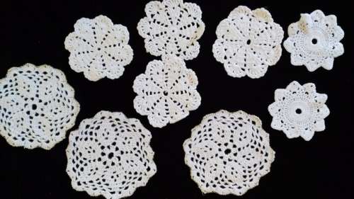 Lot of 9 small white crochet doilies