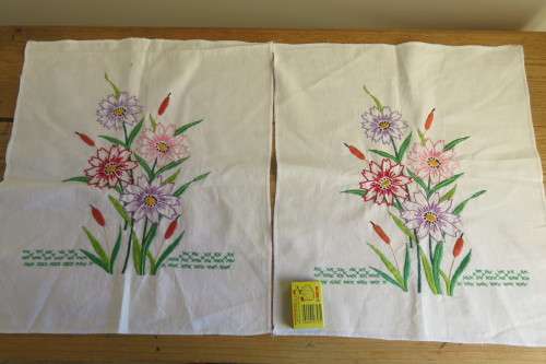Two hand embroidered cloths
