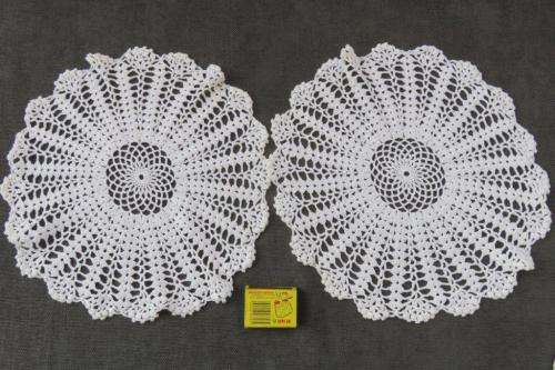 Two white doilies 30cm