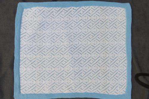 Knitted baby cot blanket - blue and white