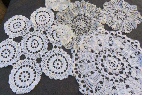 Lot of white doilies