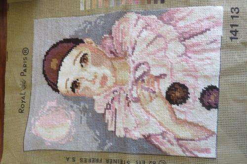 Completed tapestry of a clown