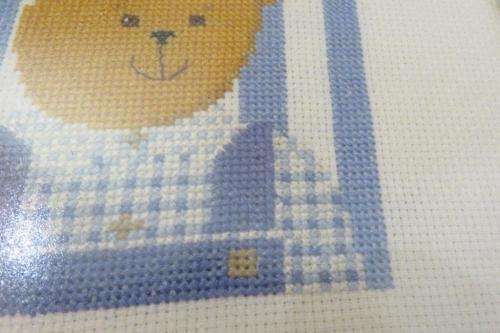 Two teddy bear cross stitch works