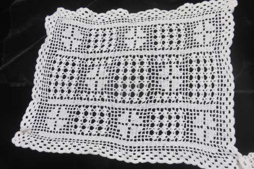 Six white crochet table mats or tray cloths