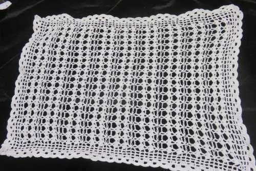 Six white crochet table mats or tray cloths