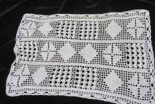 Six white crochet table mats or tray cloths