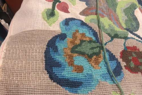Partially completed tapestry with wools