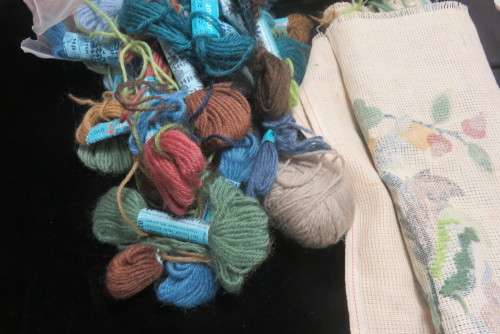Partially completed tapestry with wools