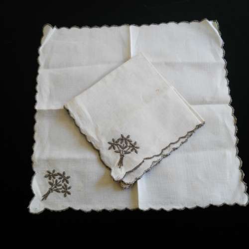 Set of 2 embroidered linen napkins 27 x 27cm - one has a few ight rust stains (due to age)