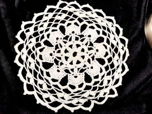 1 whitecrochet doilie 28cm