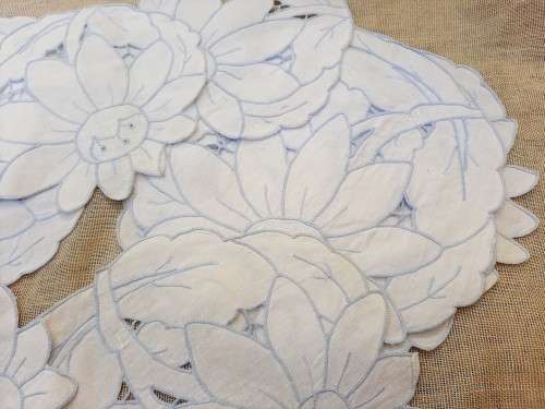 Set of 12 small embroidered doilies - white with blue stitching - cutwork