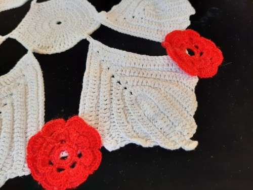 White hand-crochet doilie with red flowers 34cm