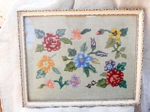Charming tapestry of  flowers in vintage frame.