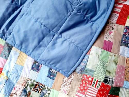 Lovely, colourful quilt for a cot - blue- 126cm x 106cm