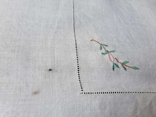 Embroidered tablecloth - white linen with pastel flowers - damaged - 102 x 102cm