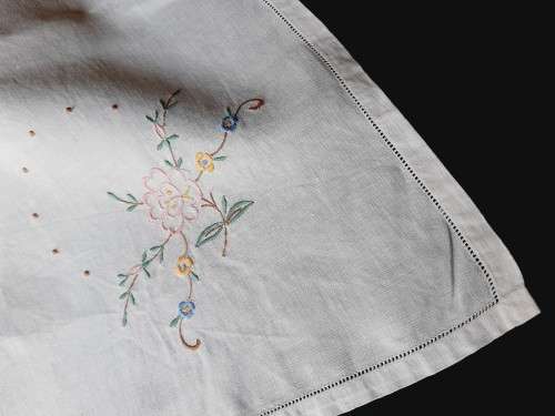 Embroidered tablecloth - white linen with pastel flowers - damaged - 102 x 102cm