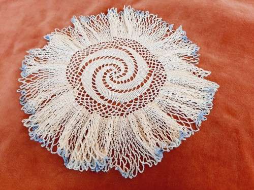 Frilly doily/ doilie with blue edge- acrylic - 23cm