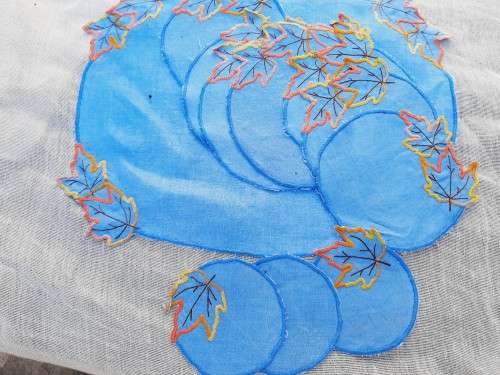Set of 13  blue embroidered mats