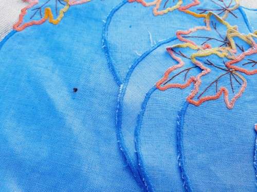 Set of 13  blue embroidered mats
