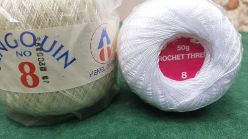 2 balls crochet yarn no. 8 Pinguin and Omega - new