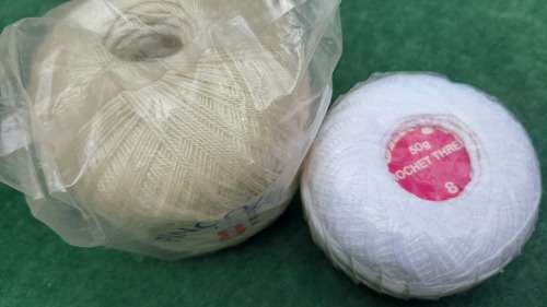 2 balls crochet yarn no. 8 Pinguin and Omega - new