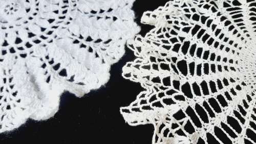 Two large round doilies - white - 37 and 35cm