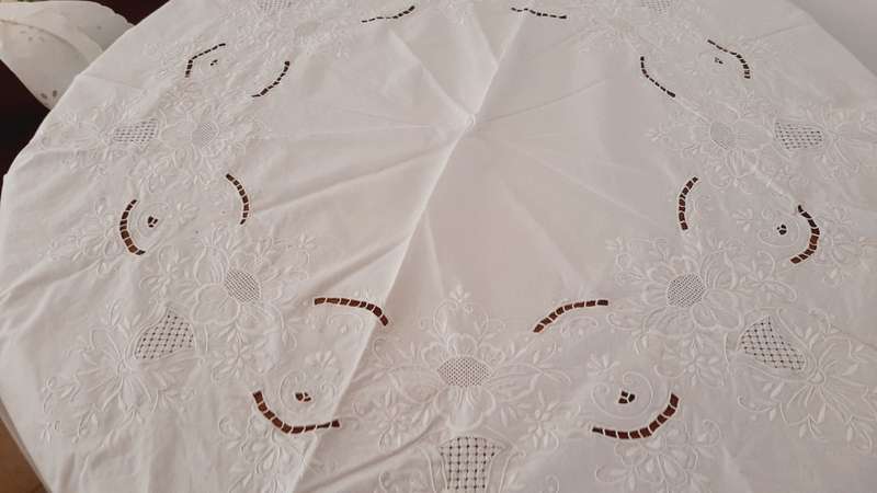 Round, white embroidered tablecloth 164cm