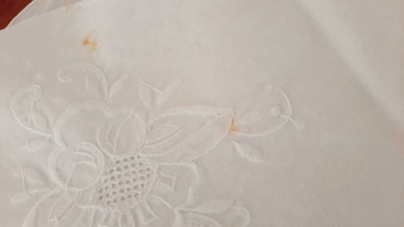 Round, white embroidered tablecloth 164cm